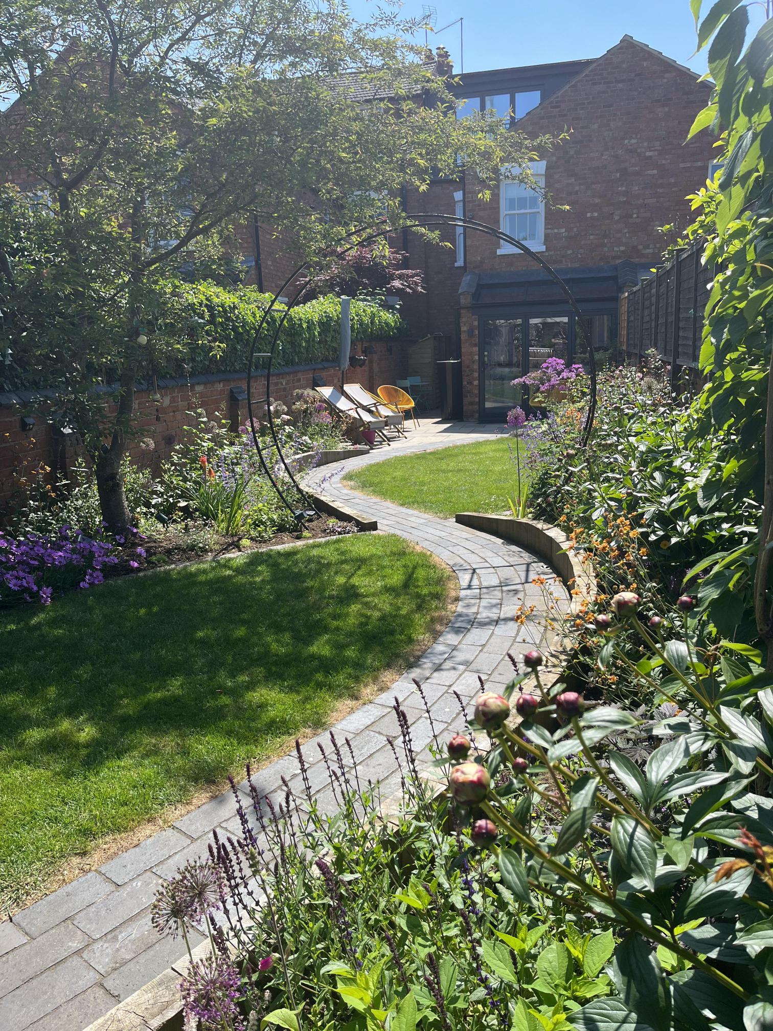 Garden design with planting and paving detail